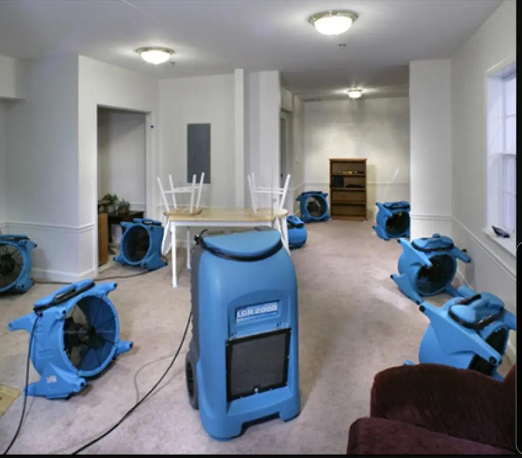 Air movers and dehumidifier setup for Water Damage Restoration in Greenwood
